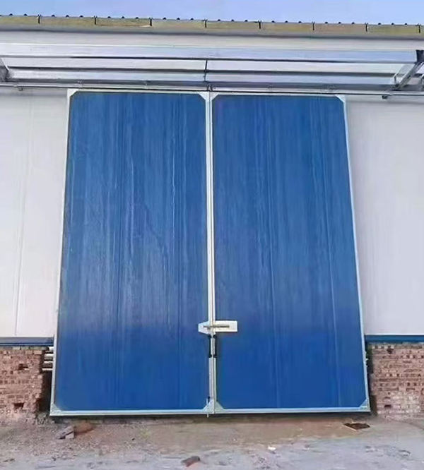 雄关区工业门在大型仓储物流通道中的应用实例